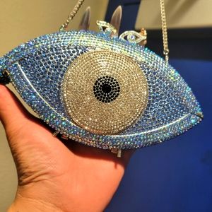 Natasha crystal eye clutch